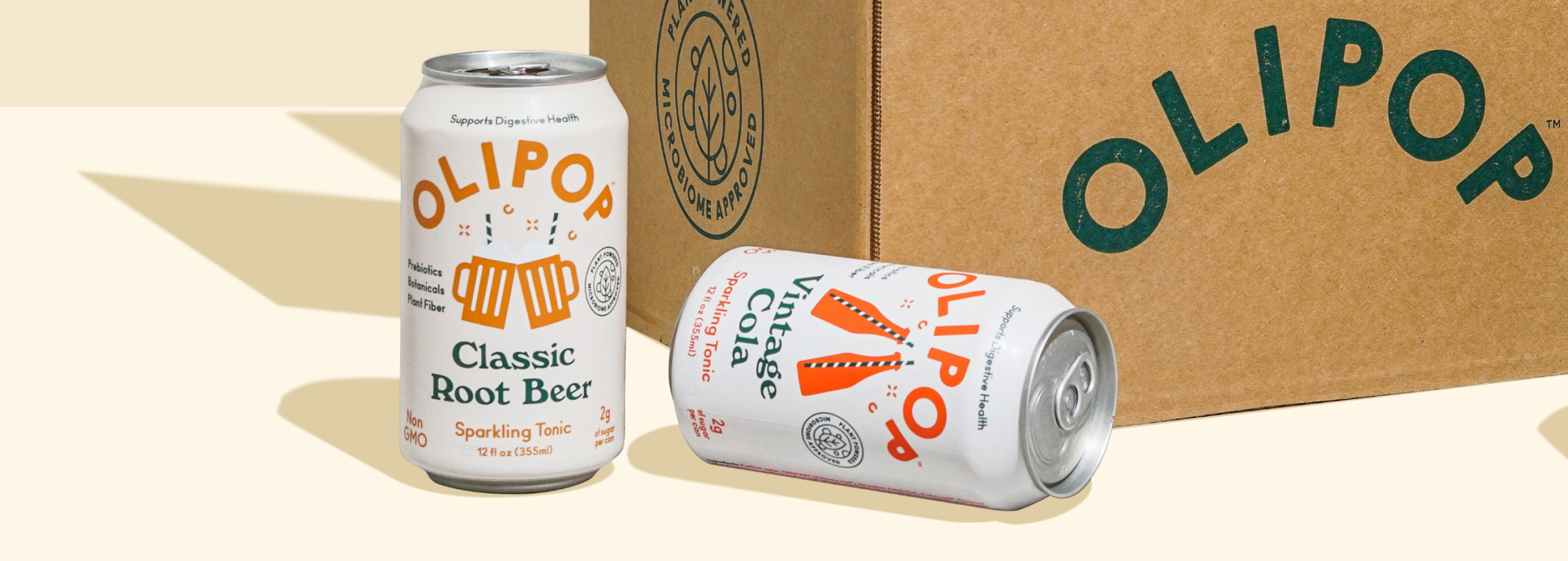 Can of Vintage Cola and can of Classic Root Beer